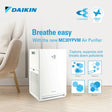Daikin air purifier advertisement with text 'Breathe easy with the new MC30YPVM Air Purifier' in a room setting.