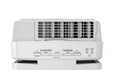 White air conditioner on a green background