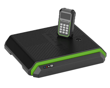 Black and green electronic device on a white background