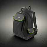 Black backpack with green accents on a dark background