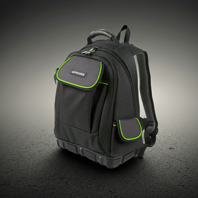 Black backpack with green accents on a dark background