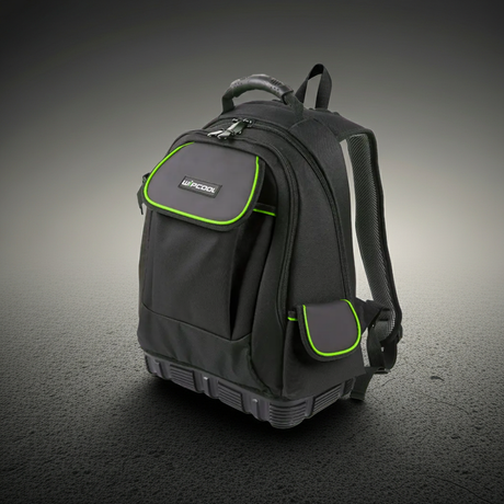 Black backpack with green accents on a dark background