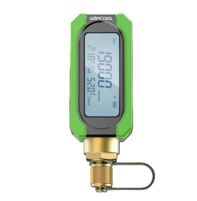 Digital pressure gauge with green casing and brass connector on a white background